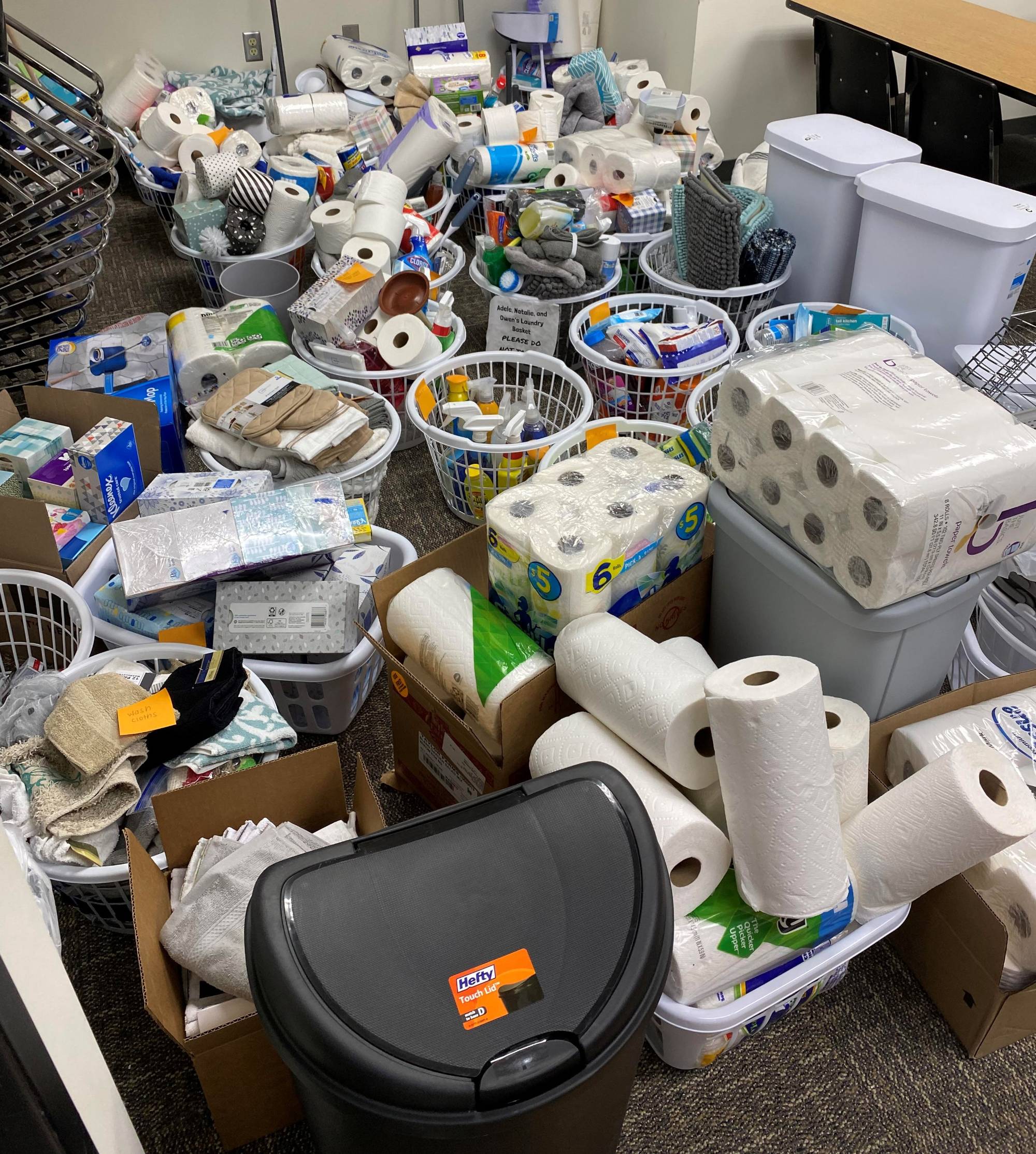 Tina Allen and student with welcome baskets they collected